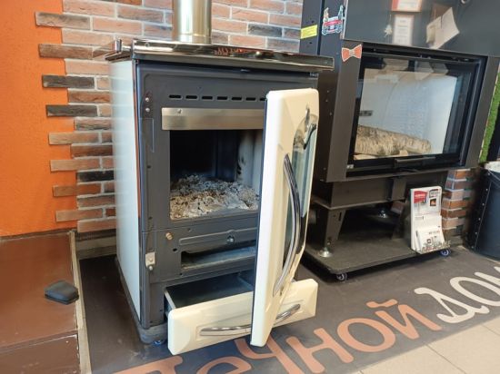 фото Отопительно варочная плита Cucinotta Cream La Nordica